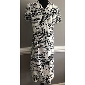 Abe Schrader 1960s short sleeved MOD black and white V-neck calf length dress